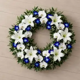 Ethereal White Lily and Blue Orchid Funeral Wreath