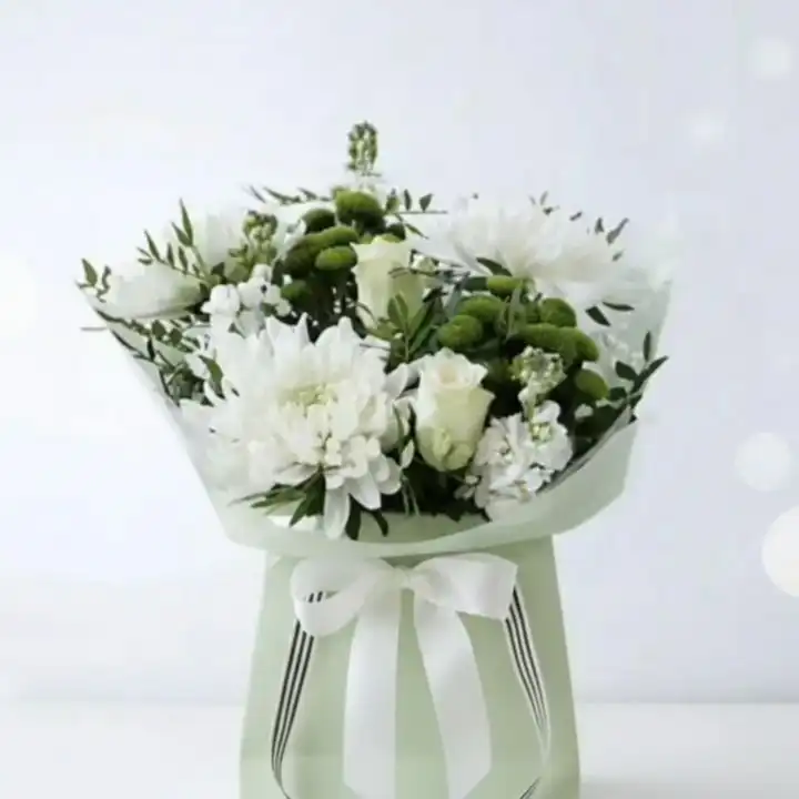 White Rose and Chrysanthemum Bouquet 1 Handcrafted white chrysanthemum bouquet mixed with elegant roses in a classic floral arrangement.