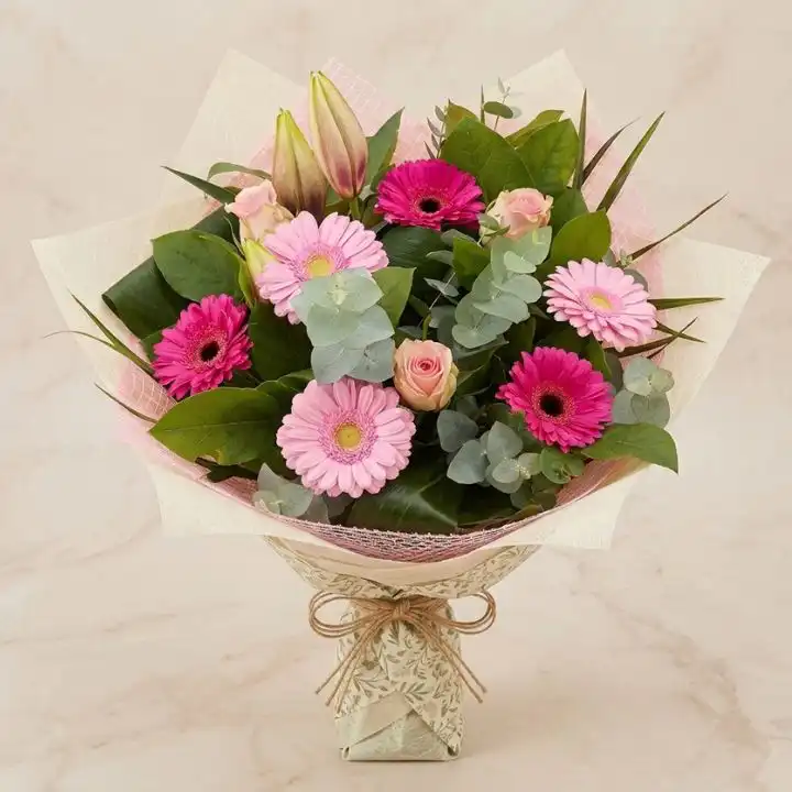 Radiant Pink Bliss: Hot Pink Gerbera & Lily Hand-tied Bouquet 1 Vibrant hot pink gerbera bouquet featuring fresh lilies in a professional hand-tied floral arrangement.