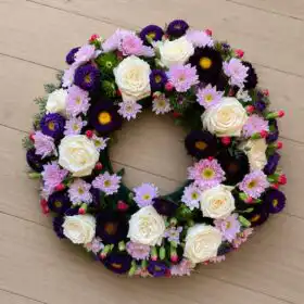 Serene White Rose & Purple Aster Funeral Wreath
