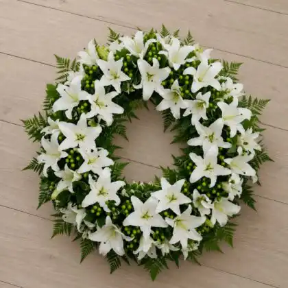 Serene White Lily Funeral Wreath