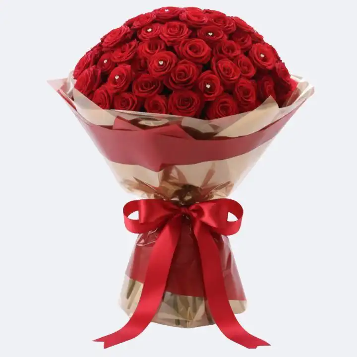 50 Radiant Luxury Red Roses 1 A stunning hand-tied bouquet of 50 luxury red roses with fresh green leaves, ideal for a grand romantic gesture.