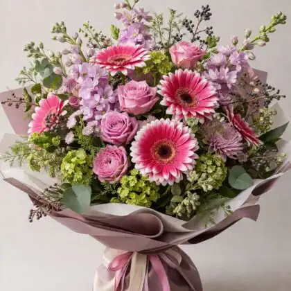gerbera daisies and roses​