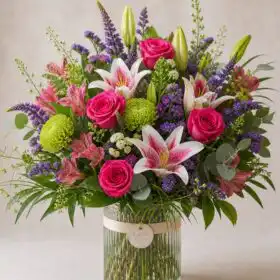 Radiant Bloom: Luxe Roses and Lilies Vase Arrangement