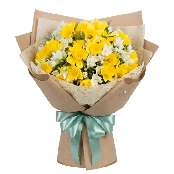 Daffodils, Freesia Flower Mixed Bouquet 1 A rustic hand-tied Yellow and White Daffodil Freesia Bouquet wrapped in brown kraft paper with a teal satin ribbon.