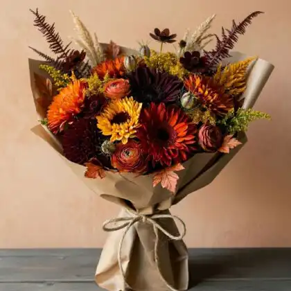 A vibrant Orange Chrysanthemums Bouquet mixed with fresh orange gerberas in a professional floral arrangement.