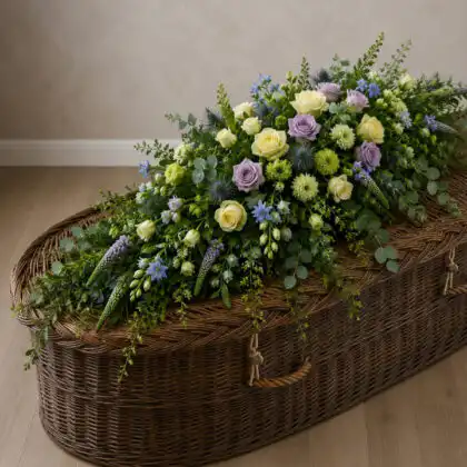 Soft Yellow and Lavender Rose Coffin Spray on coffin