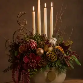 Flower arrangements with candles for christmas