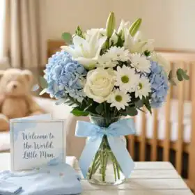 Light blue white hydrangeas lilies baby boy flowers bouquet